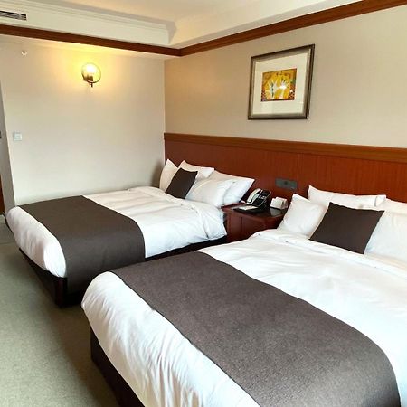 Commodore Hotel Kjongdzsu Kültér fotó