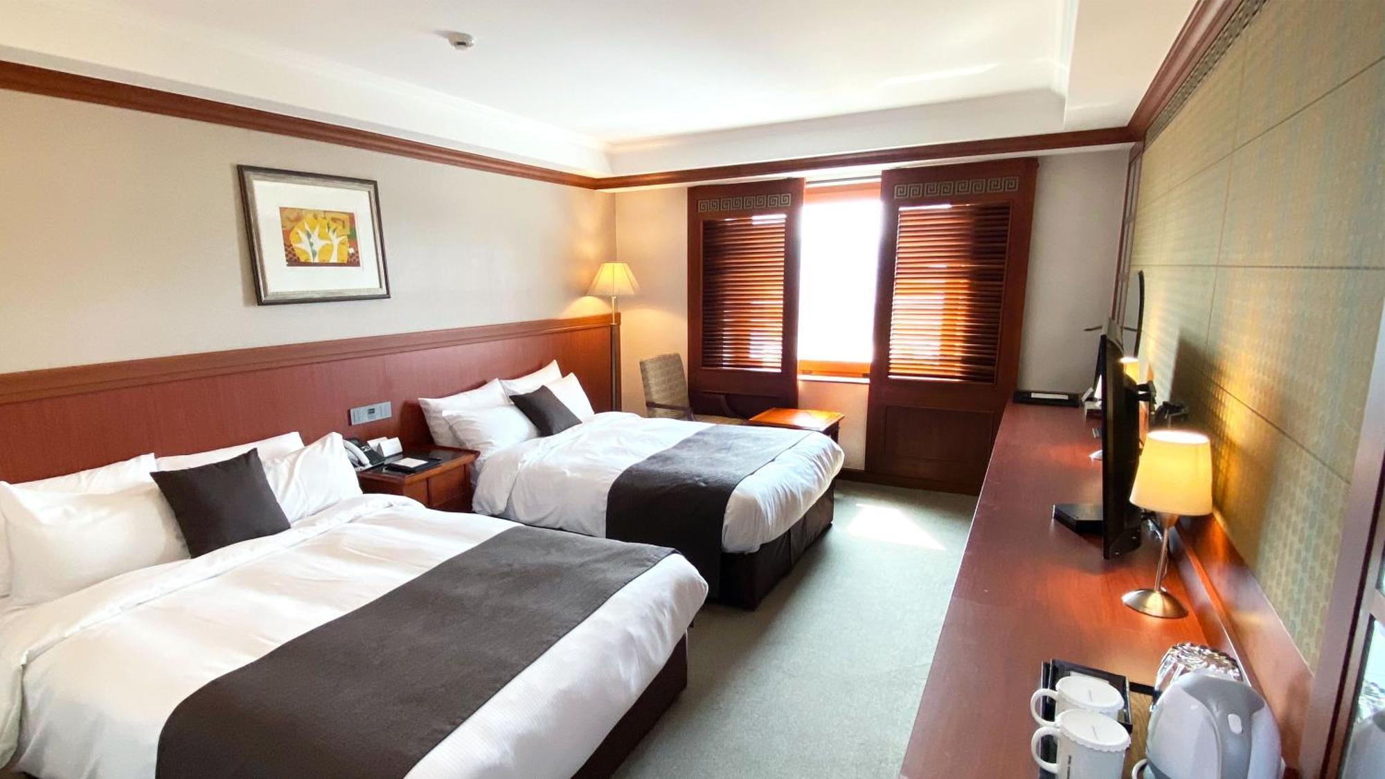 Commodore Hotel Kjongdzsu Kültér fotó