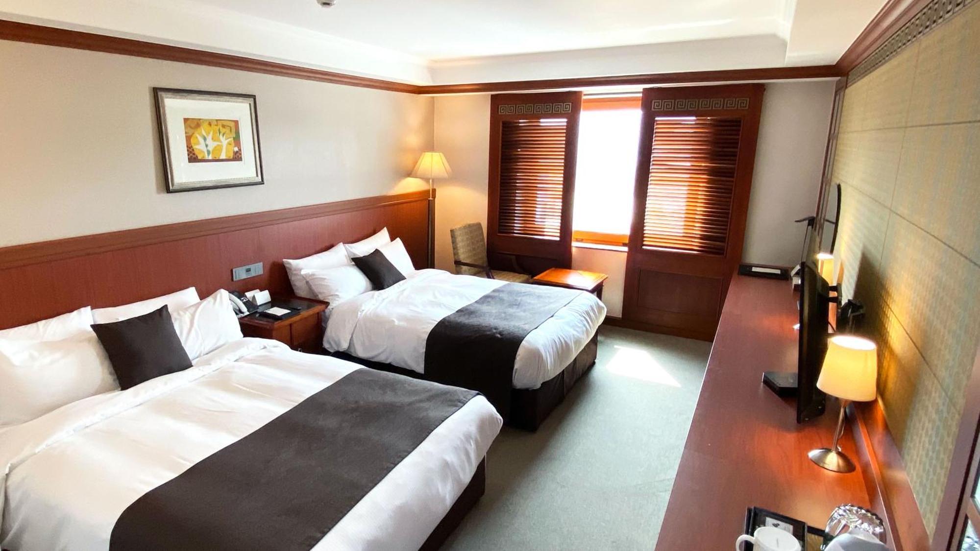 Commodore Hotel Kjongdzsu Kültér fotó