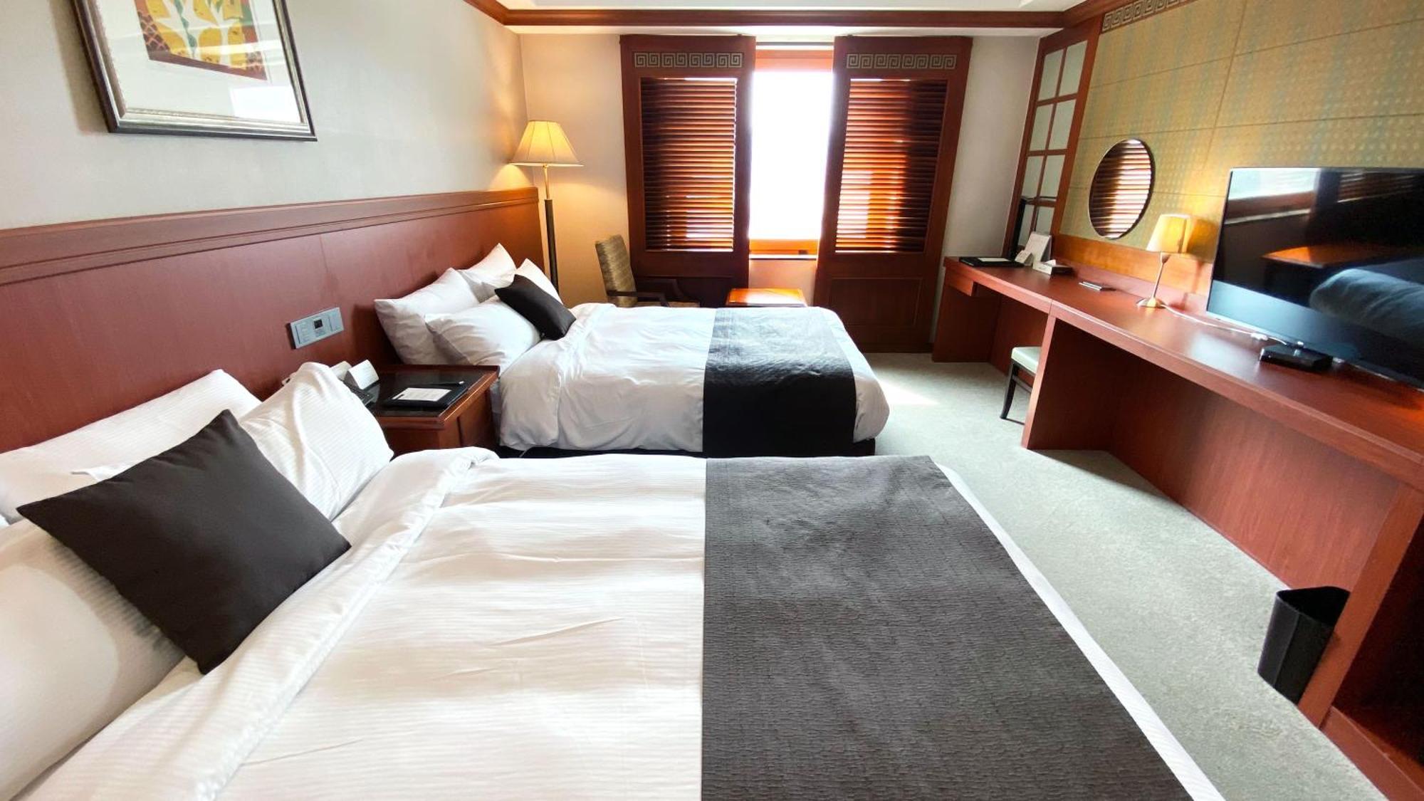 Commodore Hotel Kjongdzsu Kültér fotó