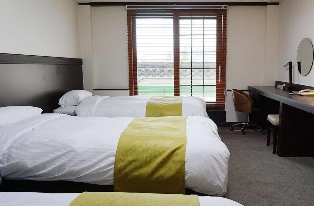 Commodore Hotel Kjongdzsu Kültér fotó