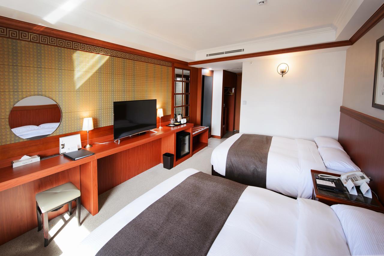 Commodore Hotel Kjongdzsu Kültér fotó