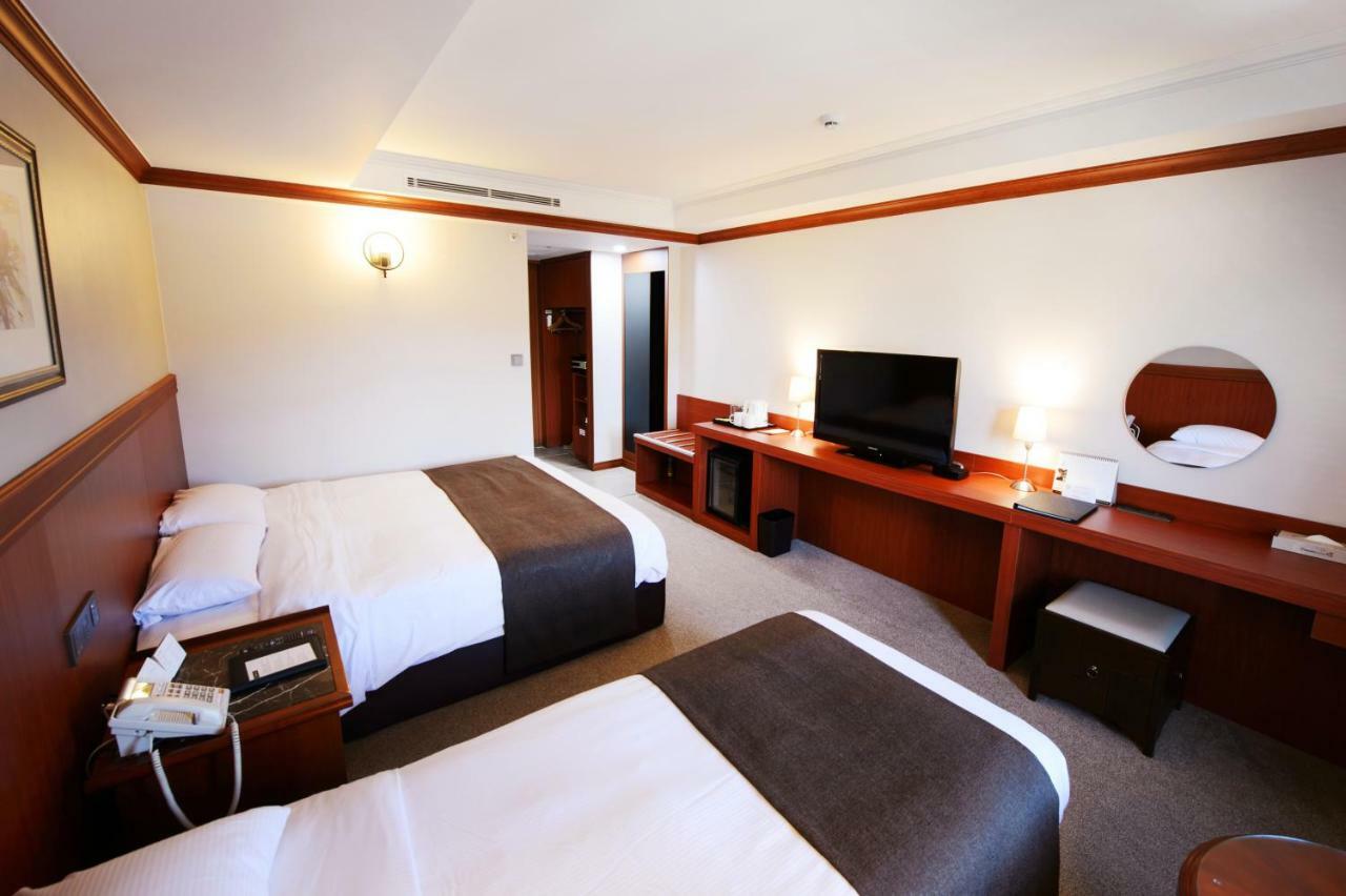 Commodore Hotel Kjongdzsu Kültér fotó