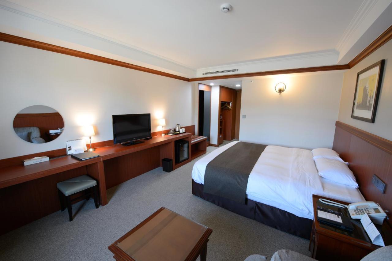 Commodore Hotel Kjongdzsu Kültér fotó